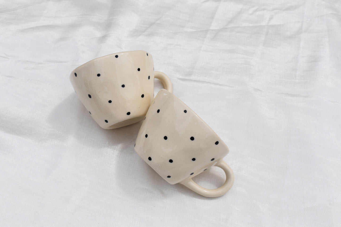 Black dotty mug