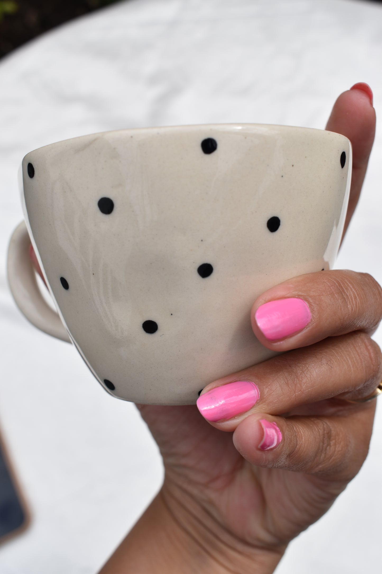 Black dotty mug