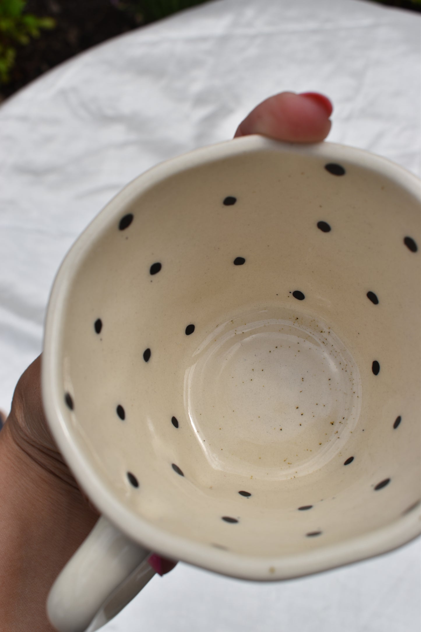 Black dotty mug