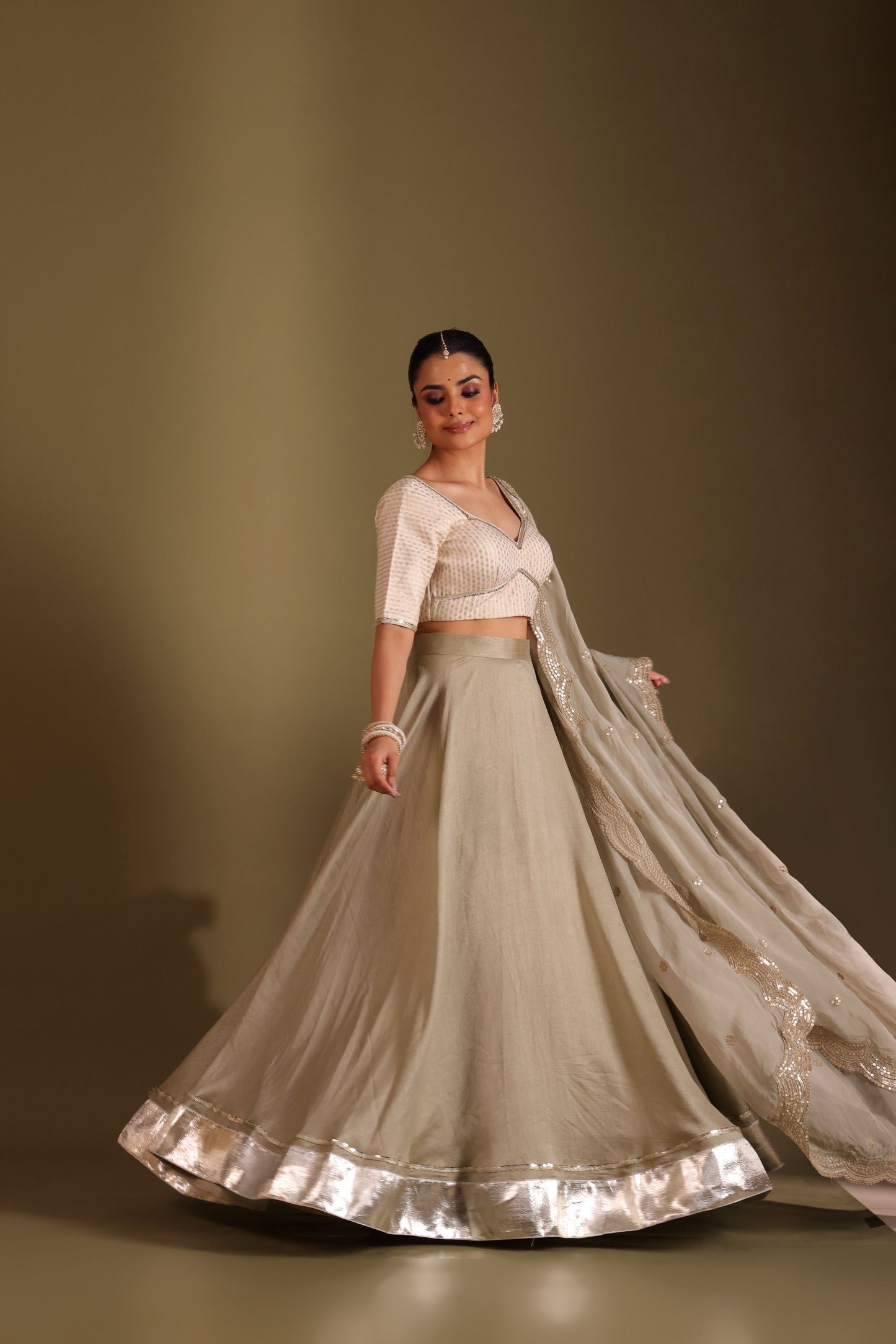 Noorika Ivory Brocade Blouse with Sage Silk Lehenga and dupatta- set of 3