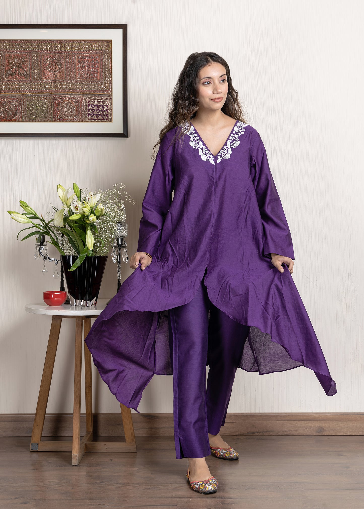 Purple chanderi assymetrical kurta with floral embroidery paired with Chanderi pants
