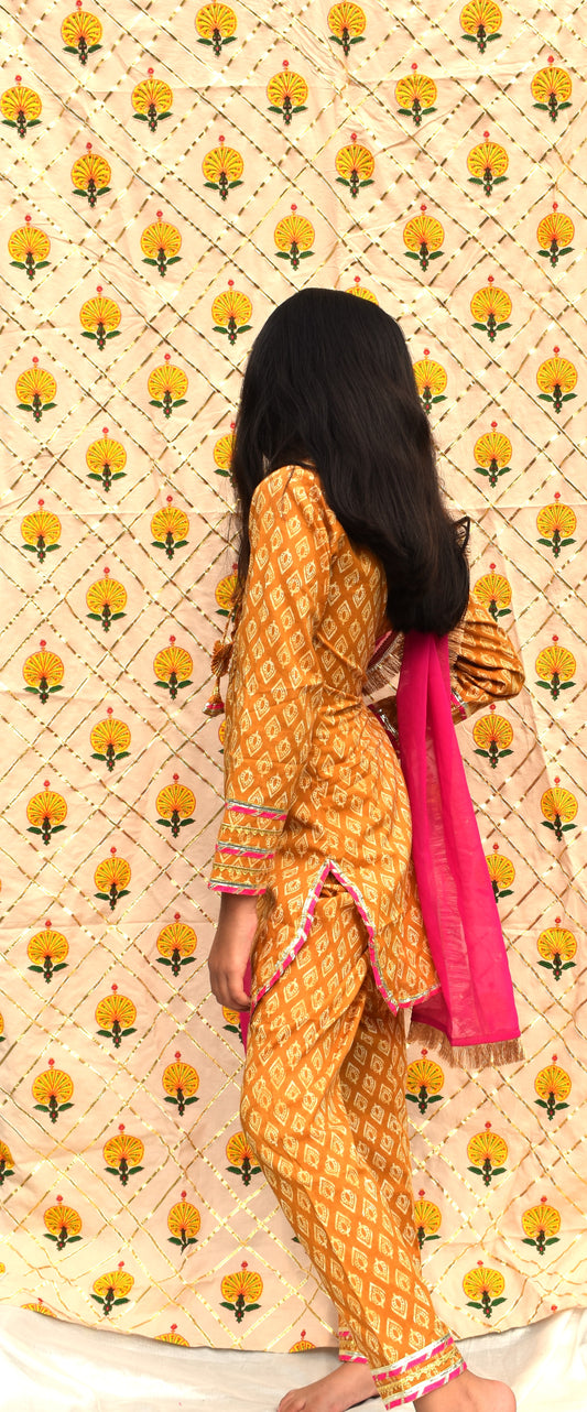 Peet : Mustard printed suit with Pink dupatta for girls
