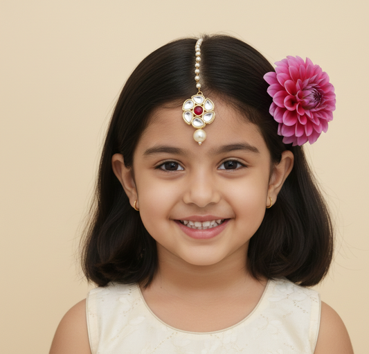 Little girl wearing floral tikka for festivites