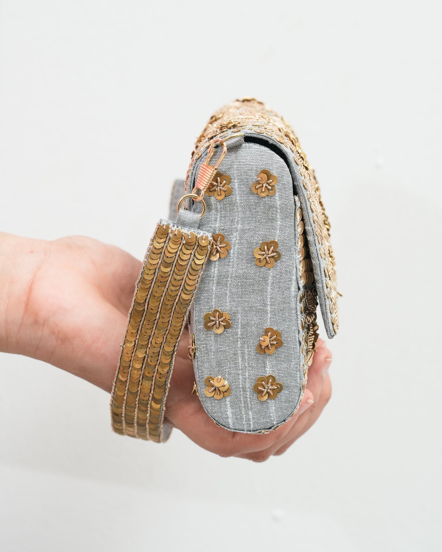 Golden silver flower clutch