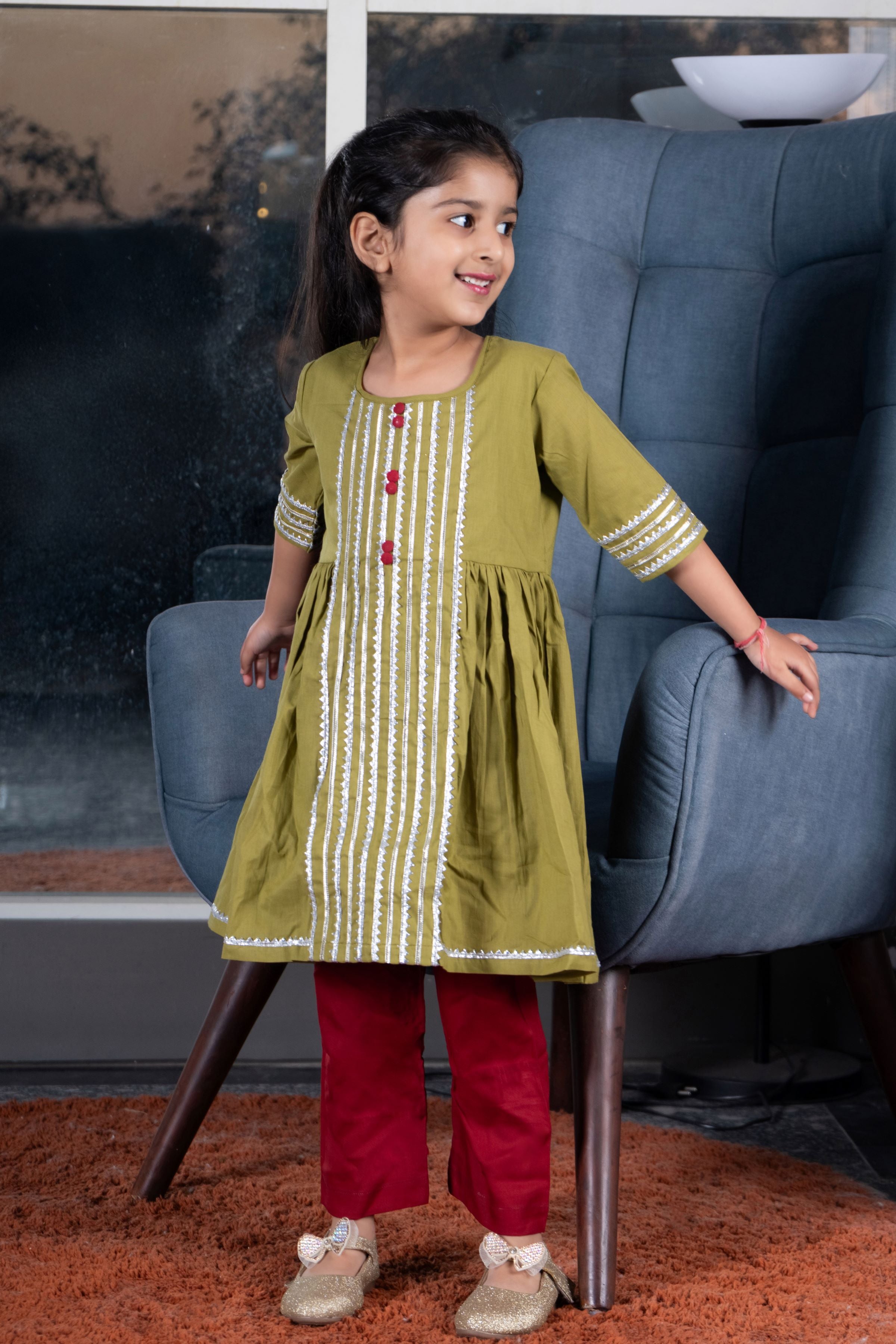 Girls green and maroon kurta payjama set