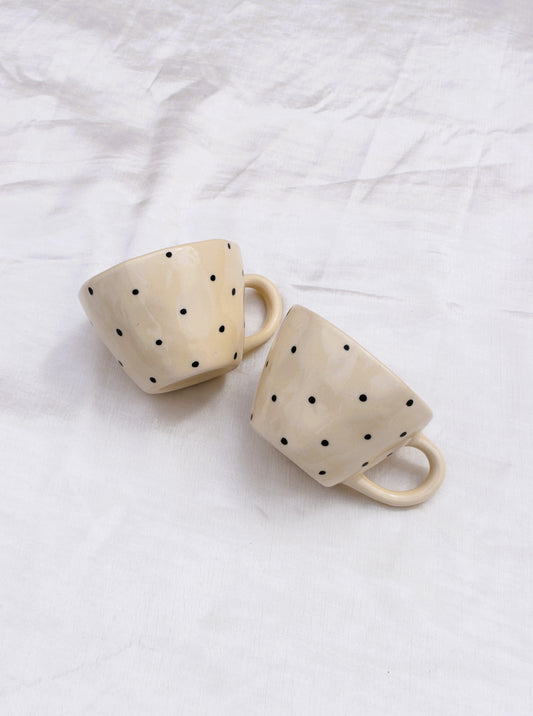 Black dotty mug