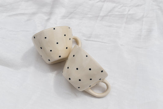 Black dotty mug