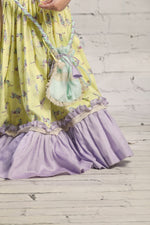Load image into Gallery viewer, Yellow animal print lehenga with frills, blouse, Potli bag set
