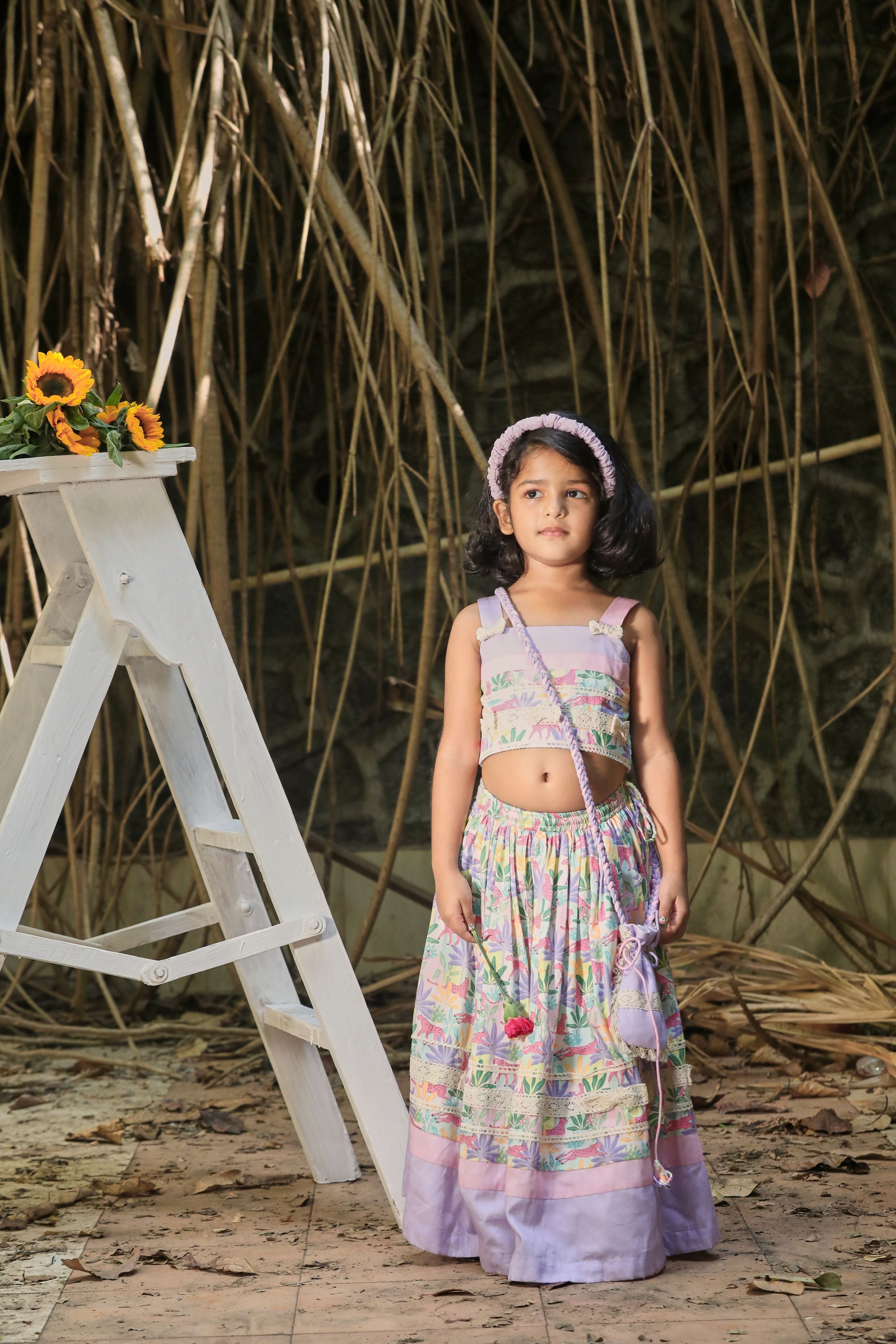 Tropical print lehenga, strappy blouse, potli bag set