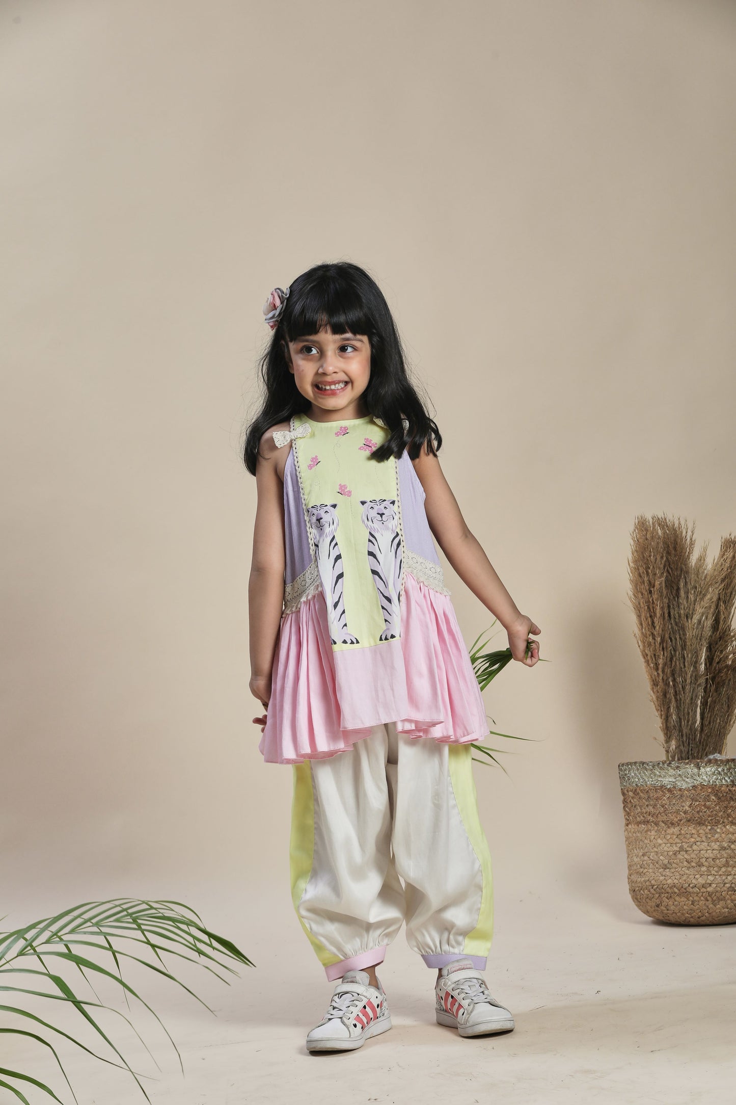 Yellow, lavender and pink A-line kurta with frills and salwar set