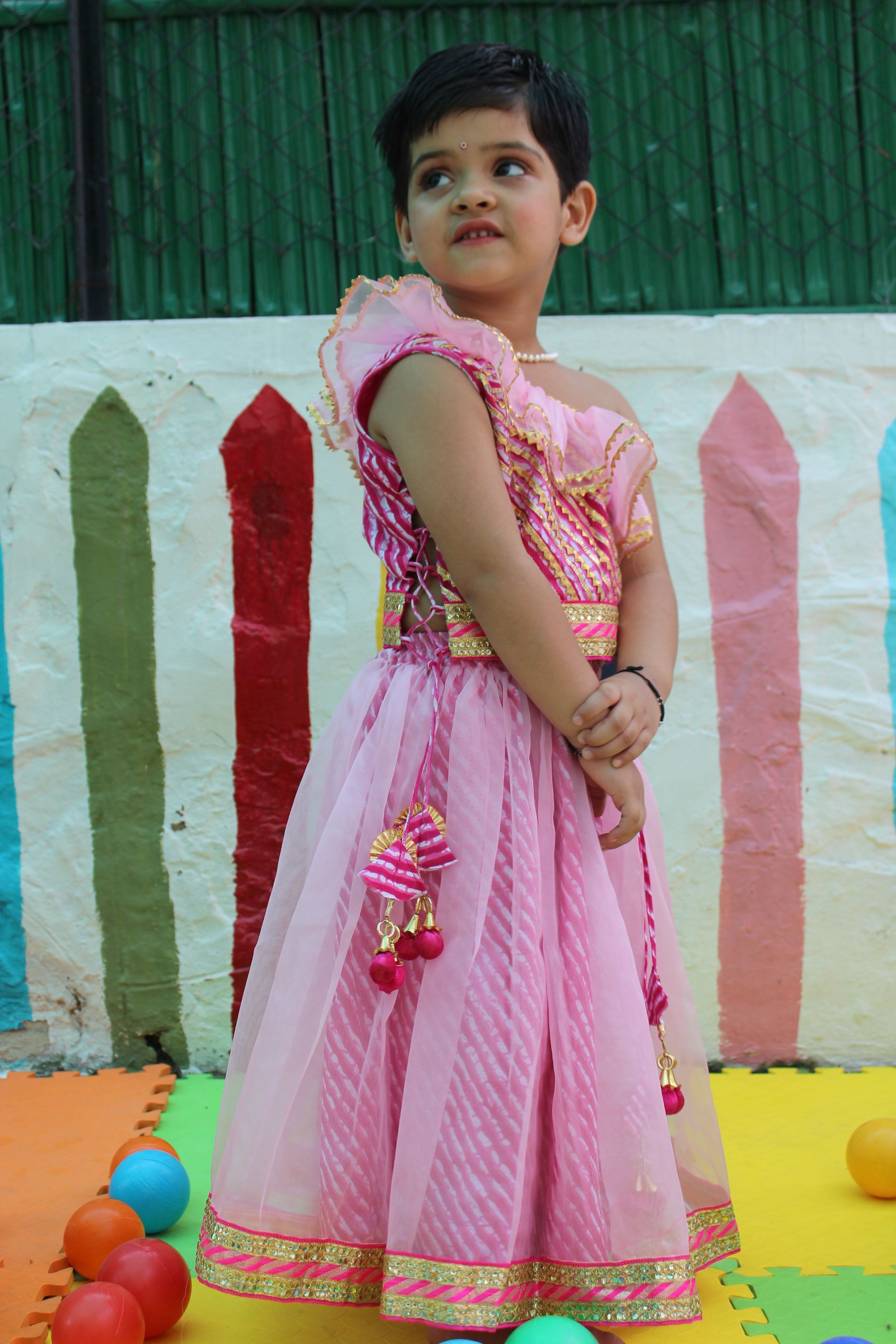 Pink off shoulder leheriya lehenga