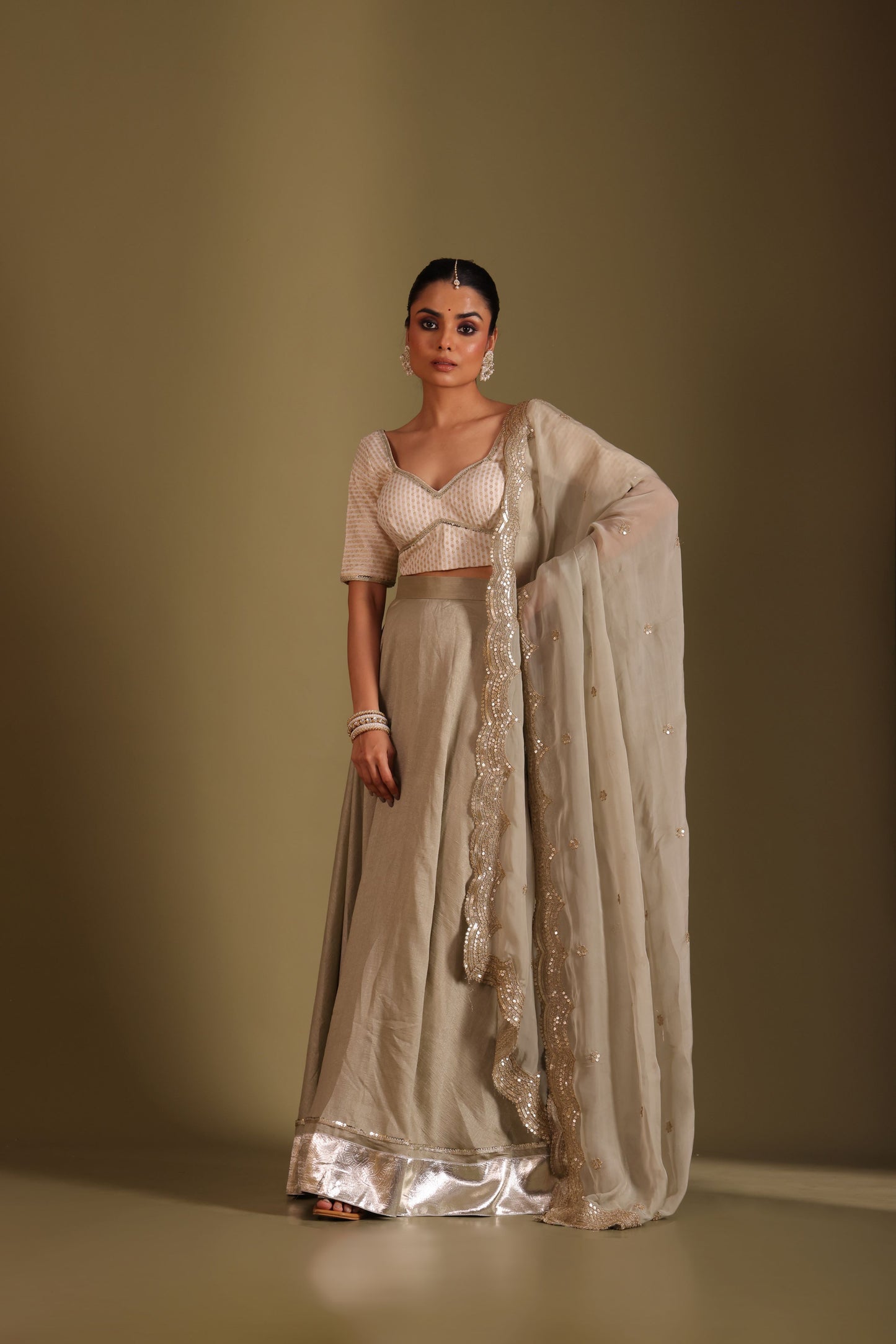 Noorika Ivory Brocade Blouse with Sage Silk Lehenga and dupatta- set of 3