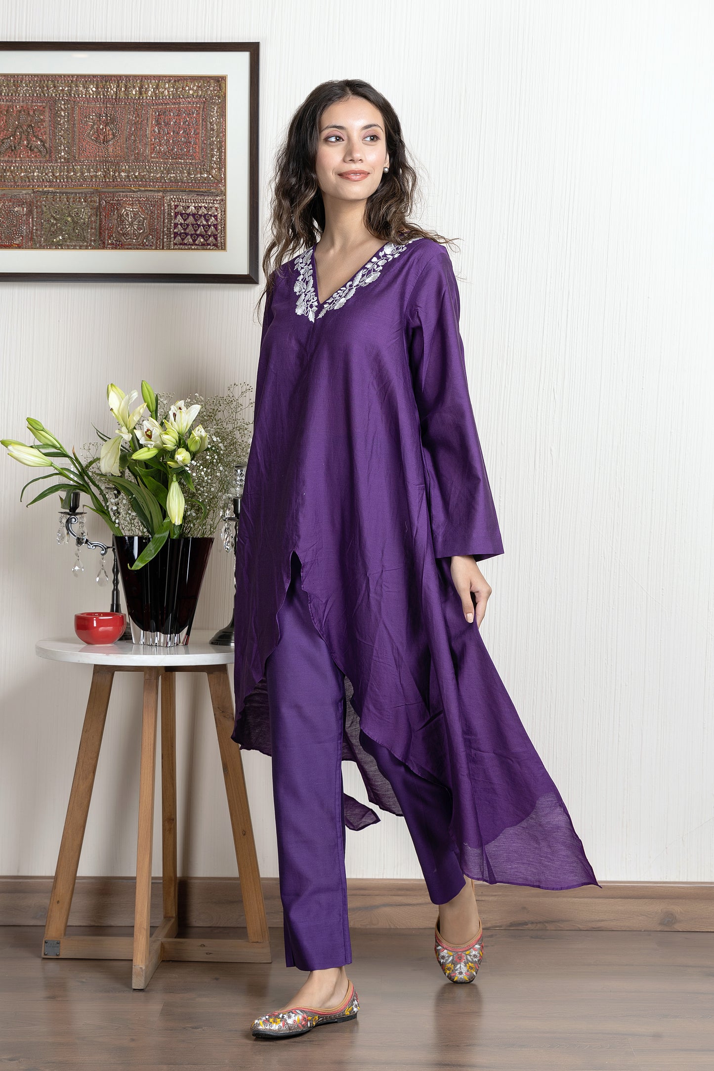 Purple chanderi assymetrical kurta with floral embroidery paired with Chanderi pants
