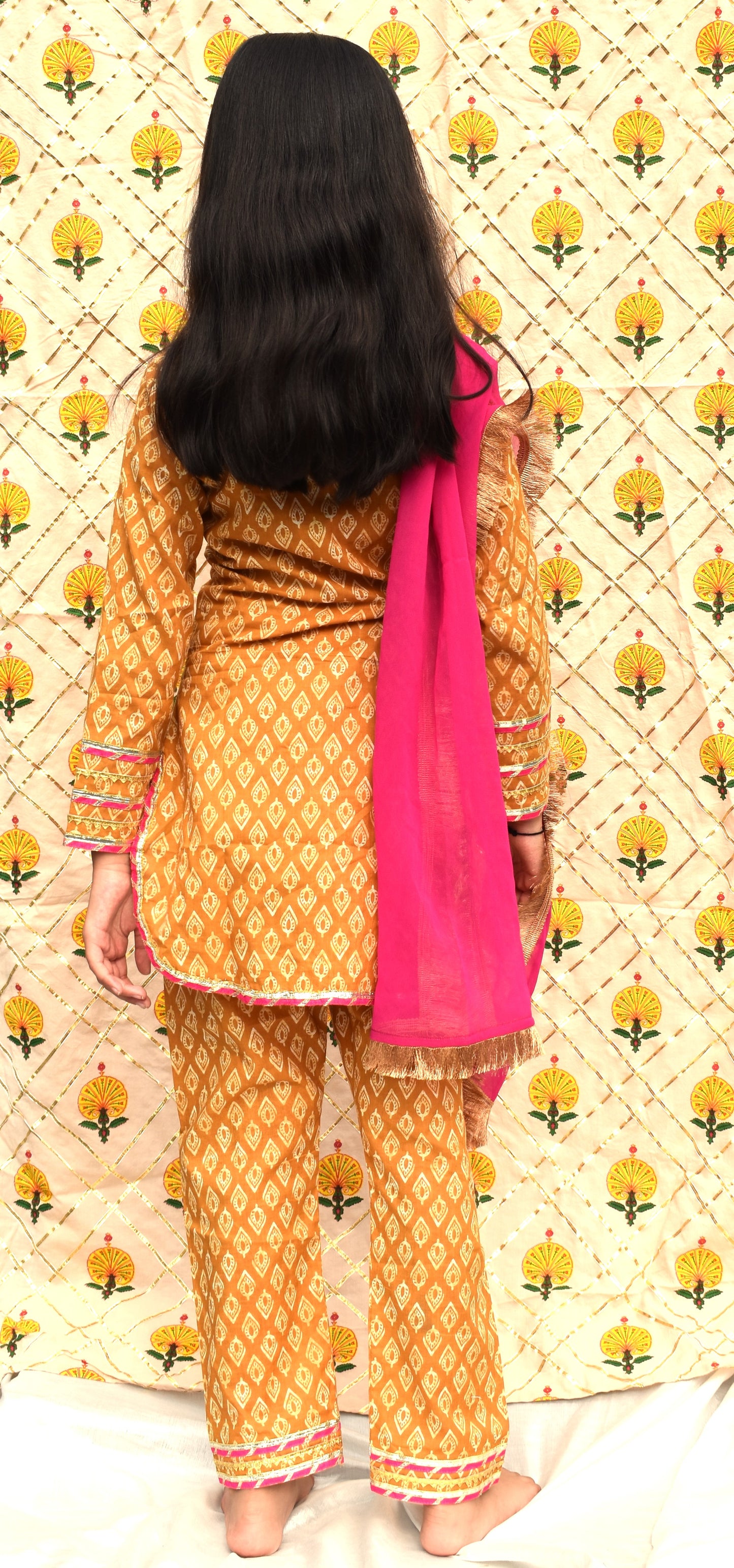 Peet : Mustard printed suit with Pink dupatta for girls