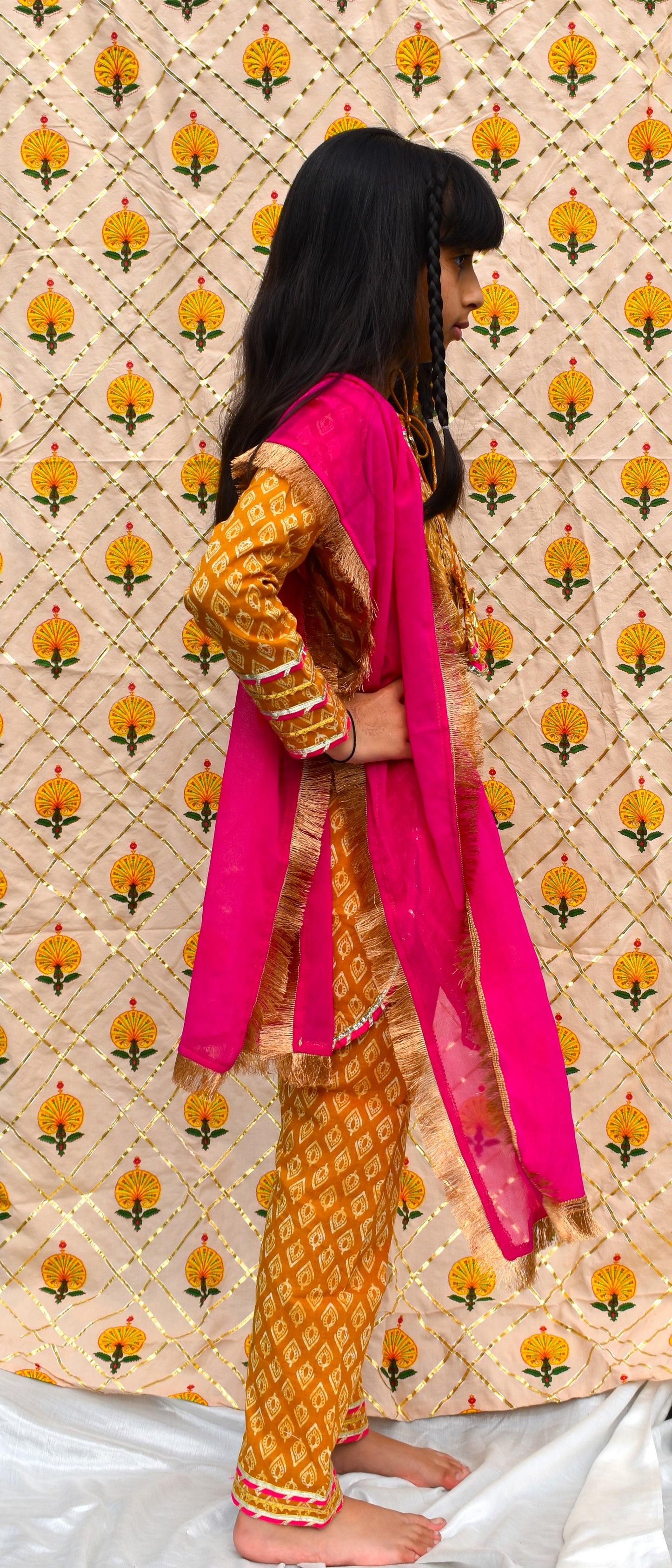 Peet : Mustard printed suit with Pink dupatta for girls